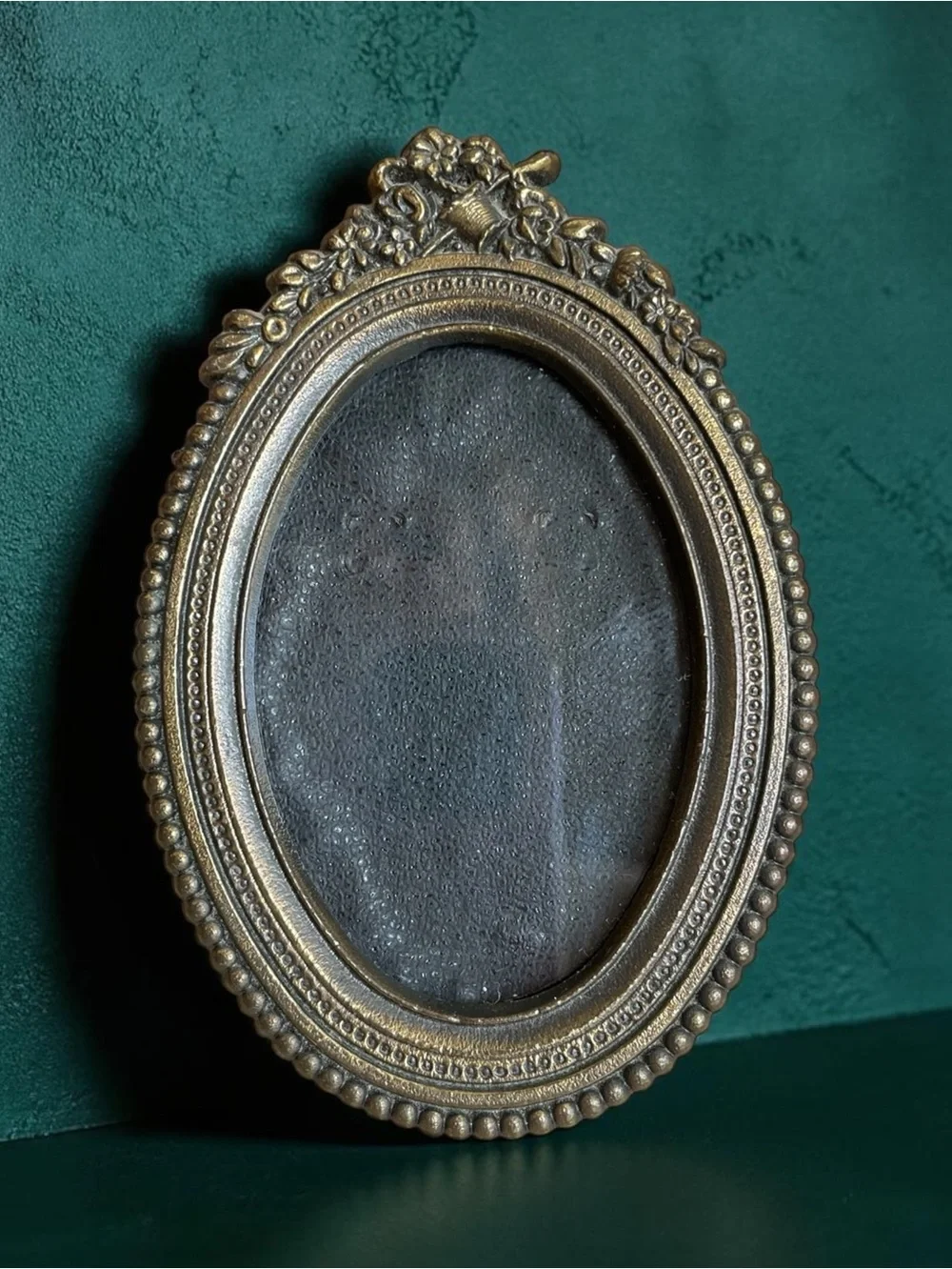 Miniature vintage oval picture frame, bronze, highly detailed